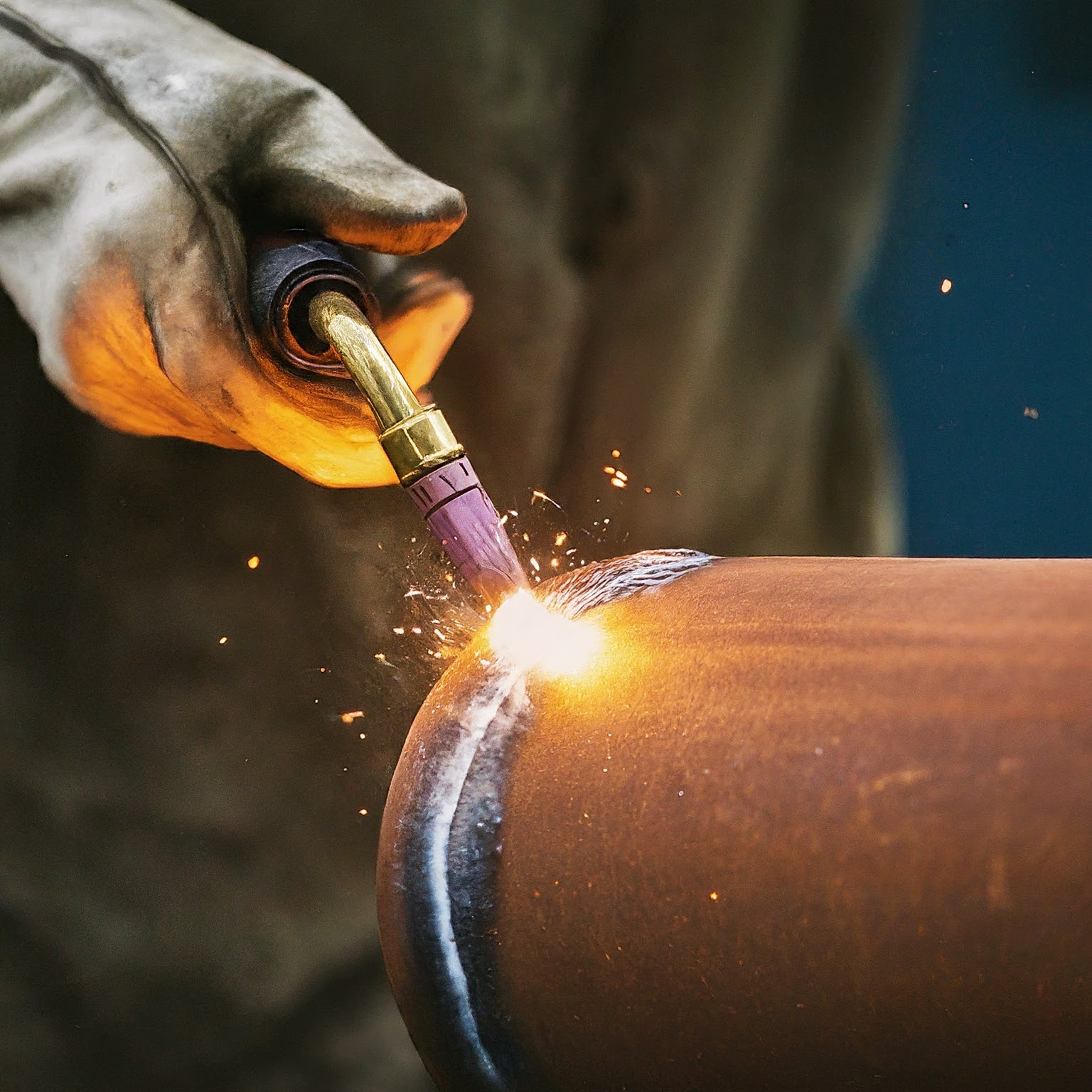 An image depicting pipe welding, a common task for offshore oil workers